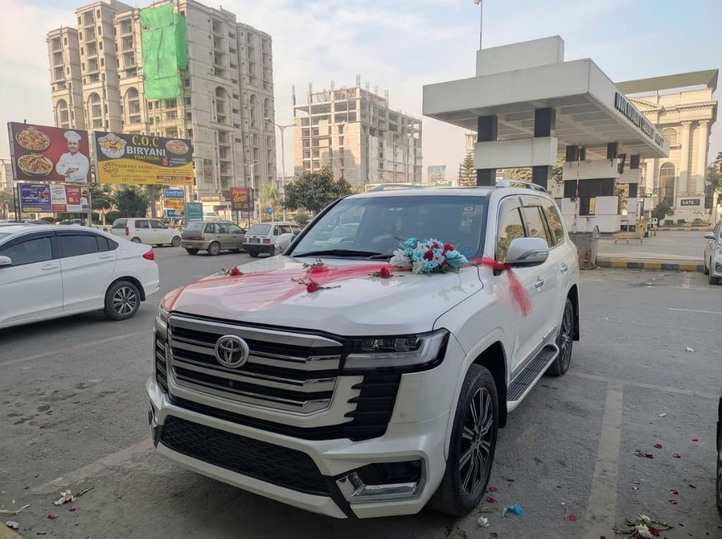 Usama Transport Solution decorated luxury Toyota Land Cruiser SUV for wedding and event rental with a driver in Islamabad