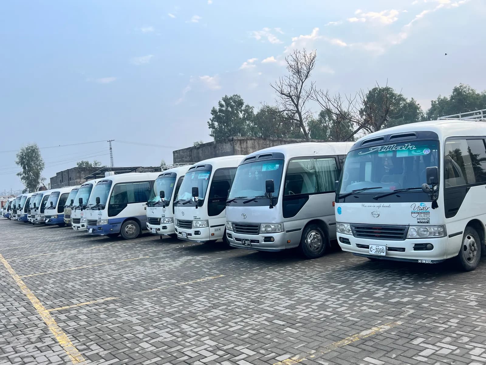 UTS Executive Toyota Coaster mini-buses line-up